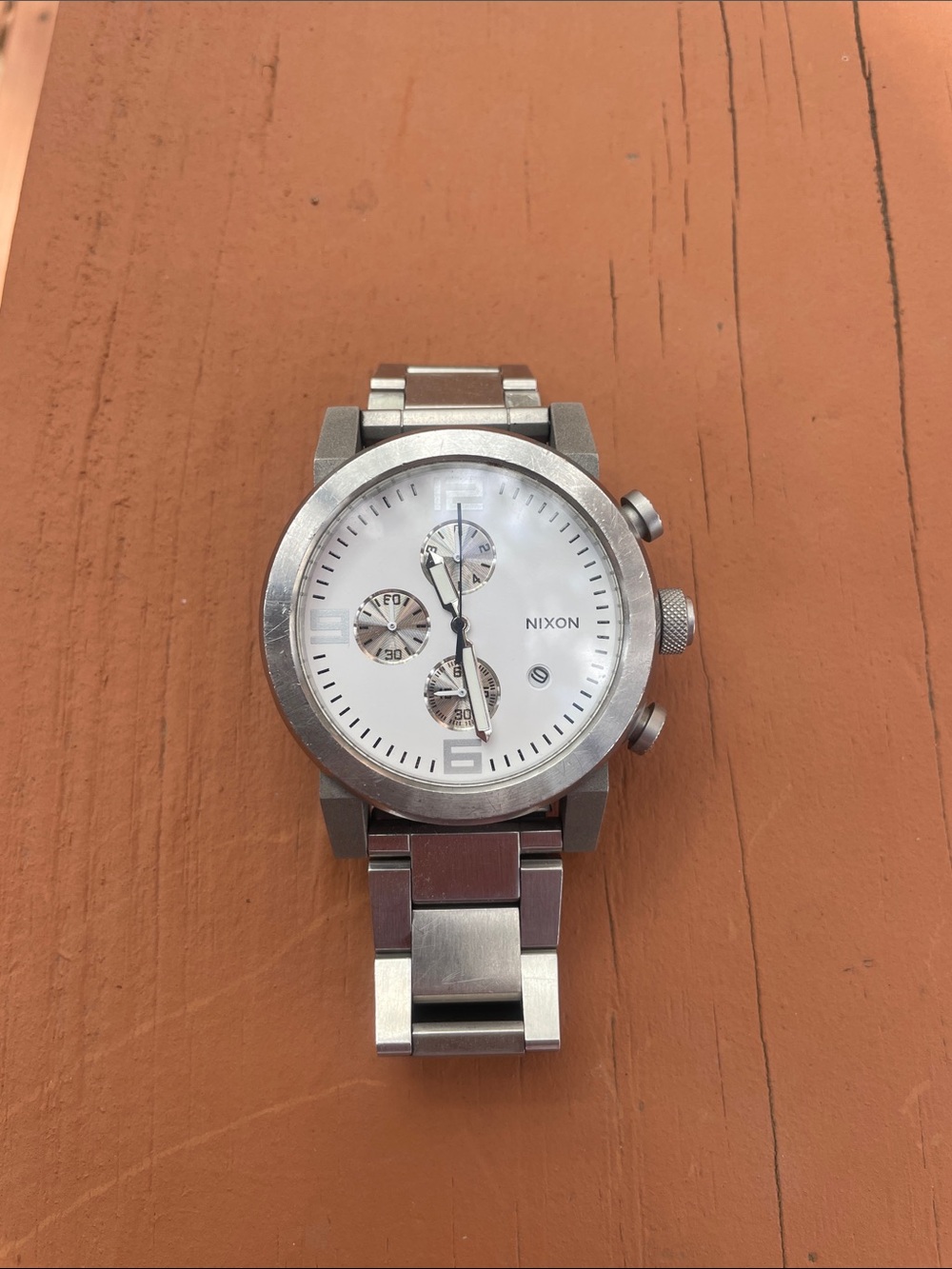 Nixon Silver Watch with White Dial Chronograph